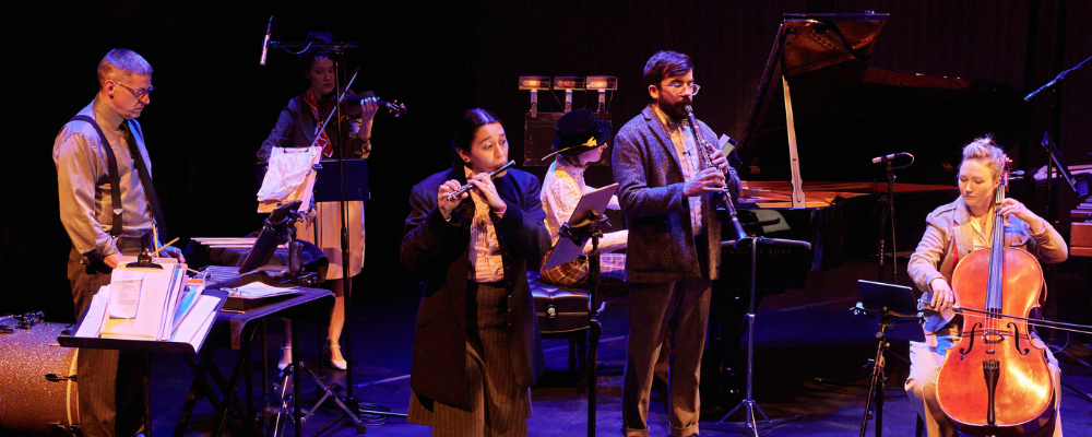 Six musicians playing various instruments